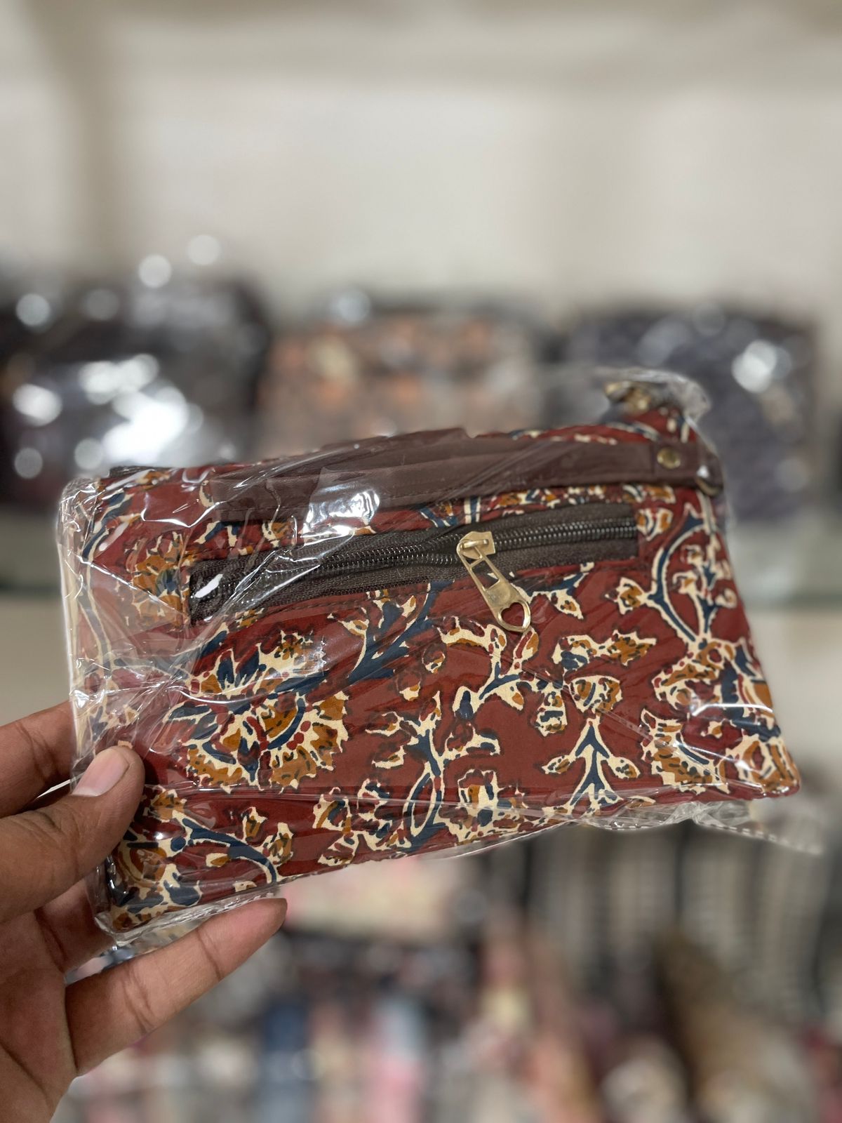Laal kalamkari flap wristlet