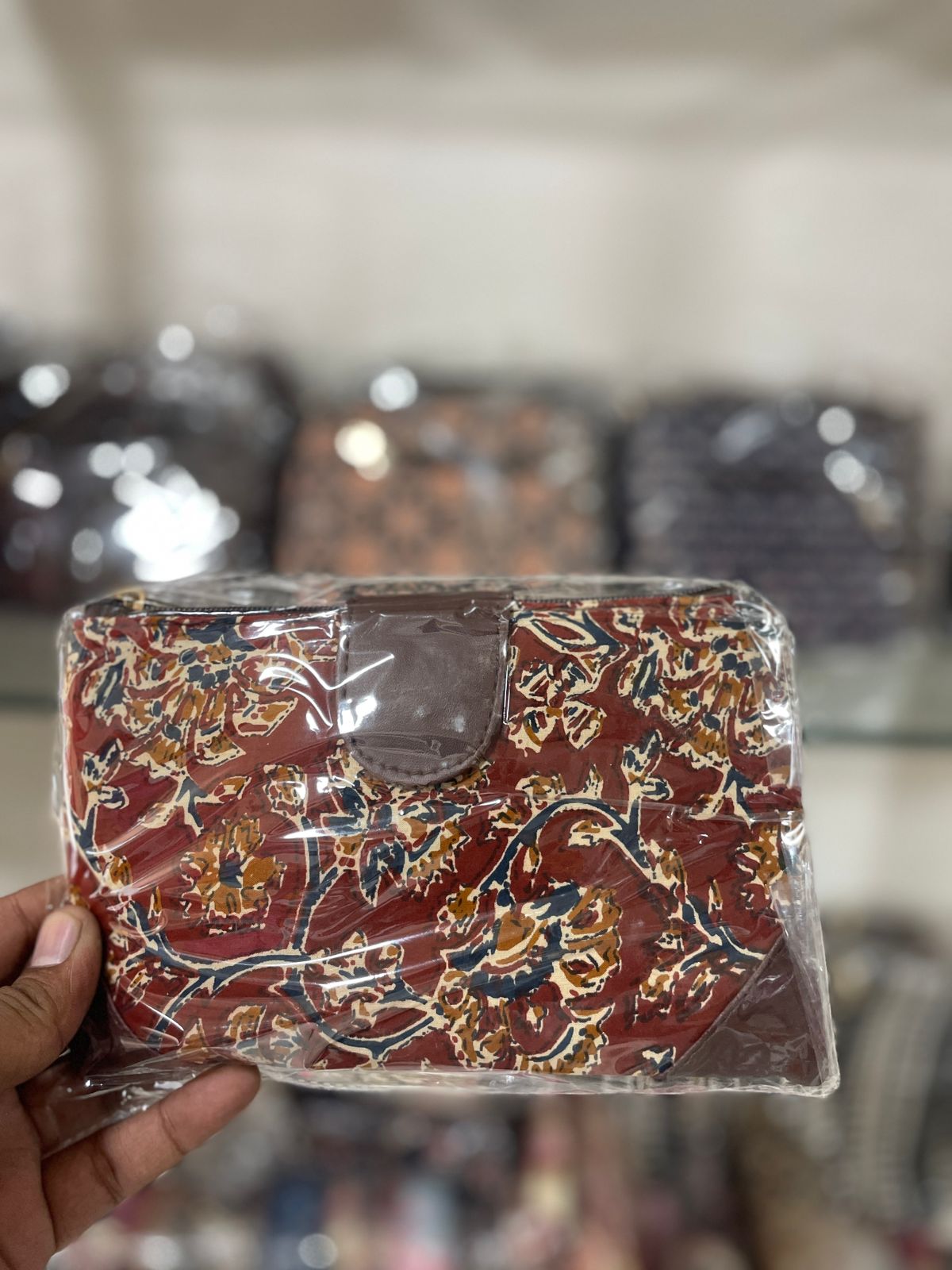 Laal kalamkari flap wristlet