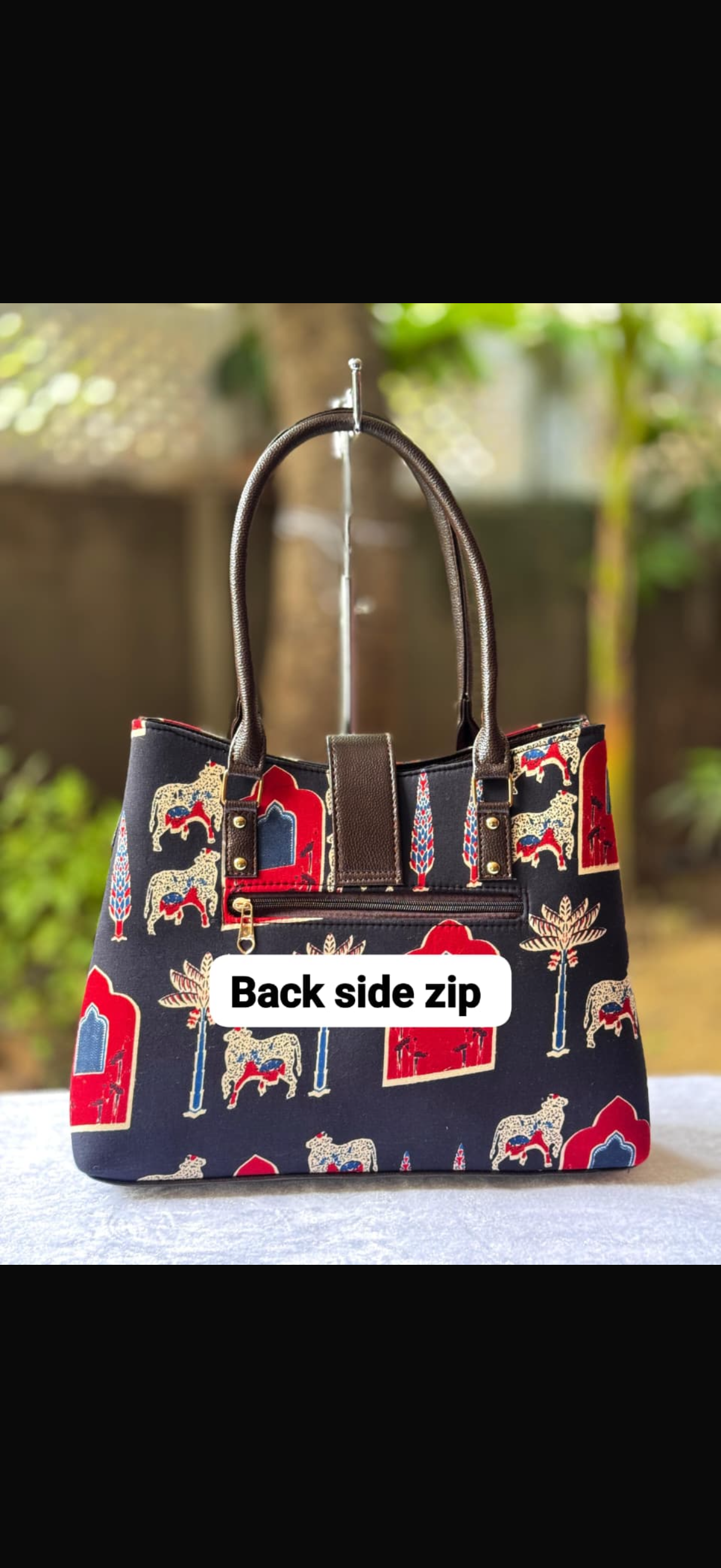 Paisley python tote cum sling