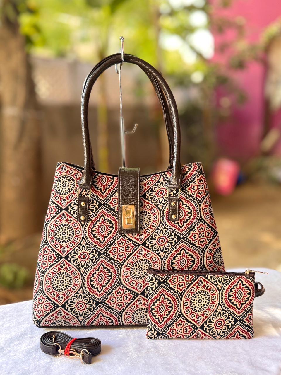 Paisley python tote cum sling